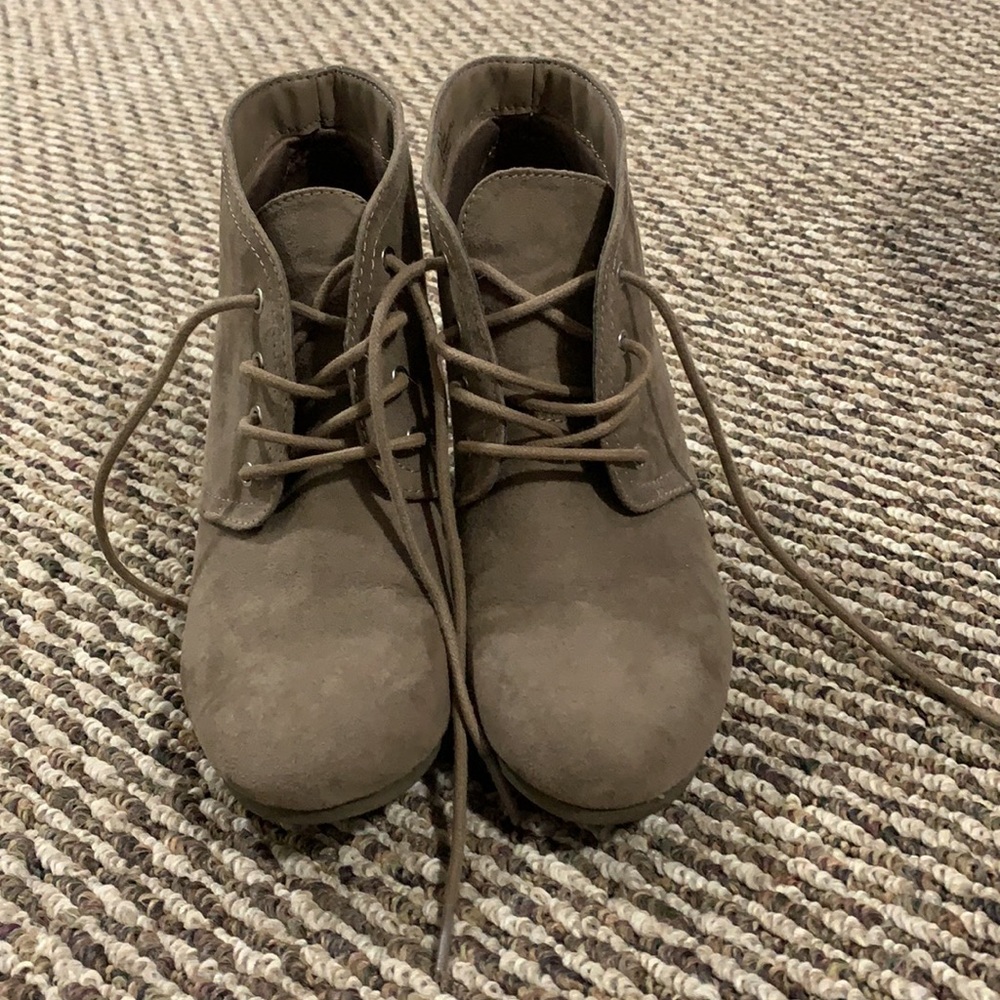 Barely worn wedge booties. Grayish-tan.Size 8.